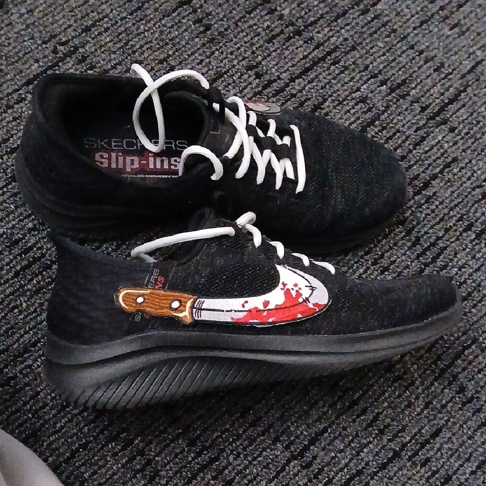 Skechers Black Slip-Ins with Knife Graphic